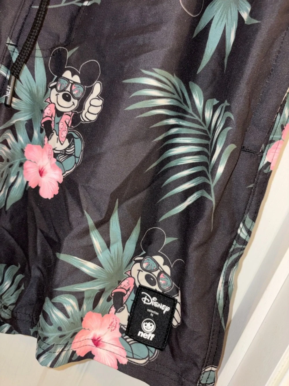 Disney Men’s Black Tropical Mickey Swim Trunks with Pink Florals